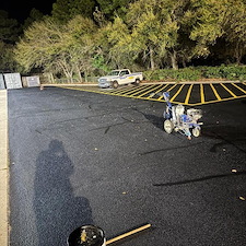 Complete-Parking-Lot-Restoration-Asphalt-Repairs-Crack-Filling-Seal-Coating-Striping-Completed-by-Brynco-Home-Improvements-in-Navarre-FL 5
